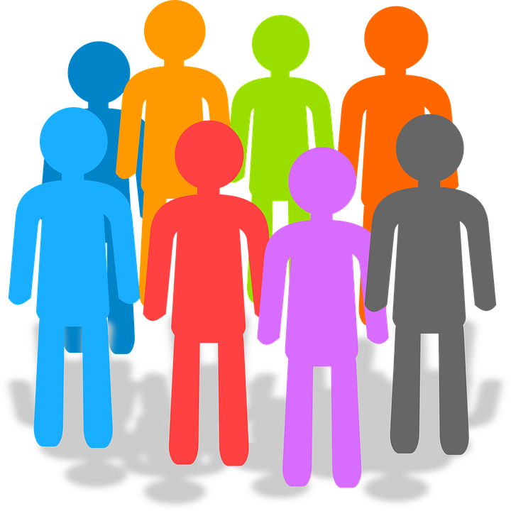 Picture of different color people standing in a group